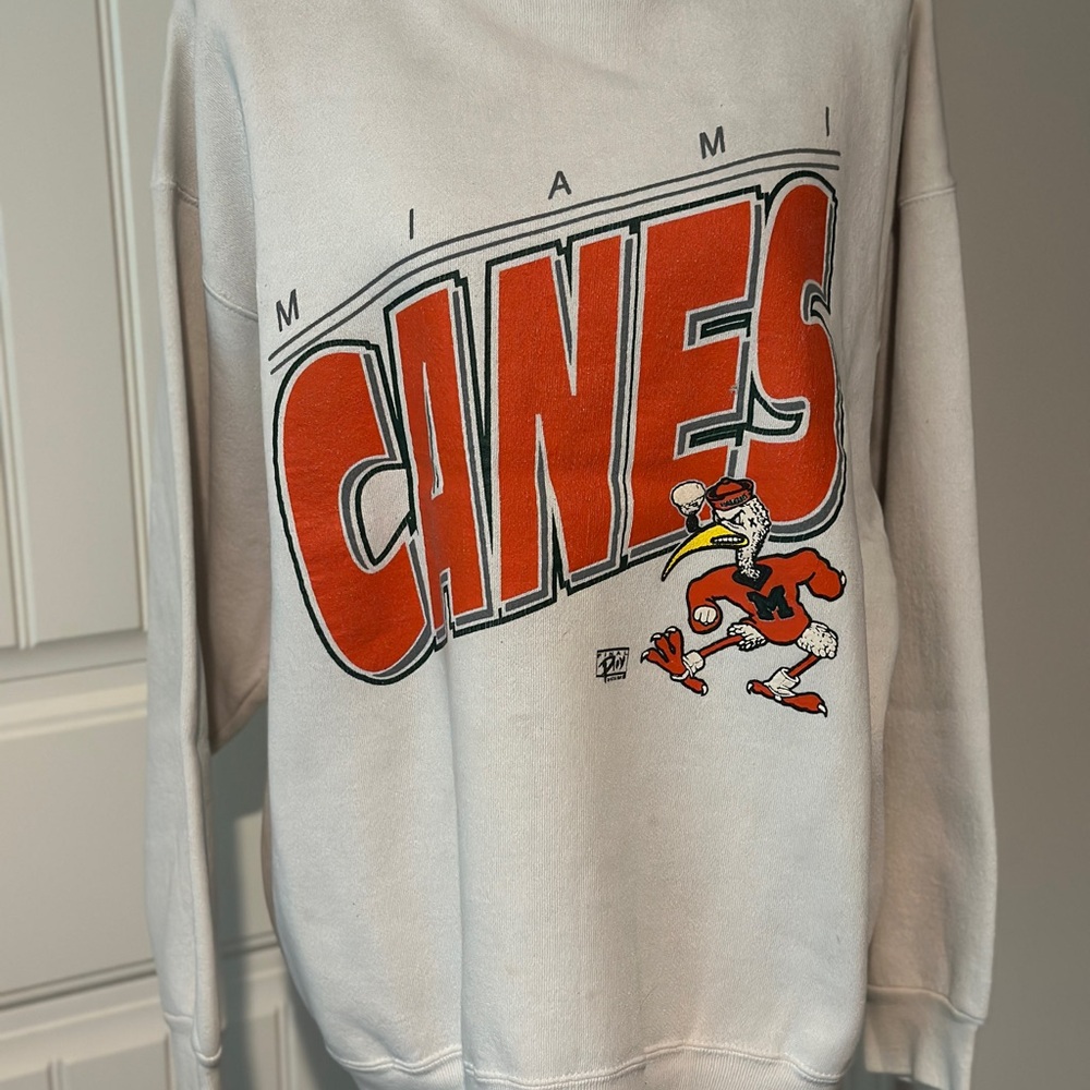White and Orange Crew Neck Sweatshirt with Dynamic Design